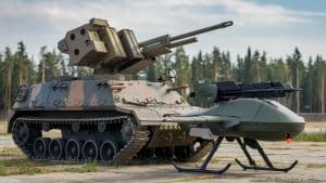 Véhicule militaire et drone armé